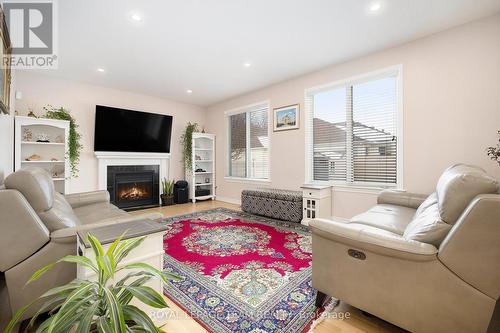 87 Gleeson Way, Ottawa, ON - Indoor Photo Showing Living Room With Fireplace