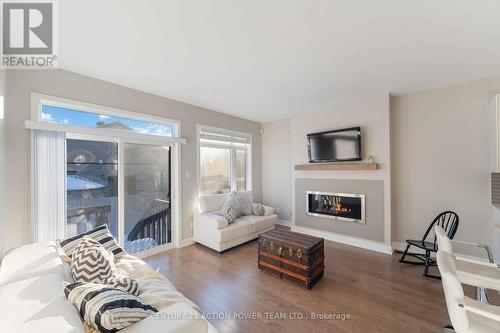 203 Joshua Street, Ottawa, ON - Indoor Photo Showing Living Room With Fireplace