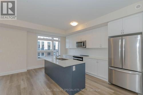 104 - 1597 Rose Way, Milton, ON - Indoor Photo Showing Kitchen With Stainless Steel Kitchen With Upgraded Kitchen