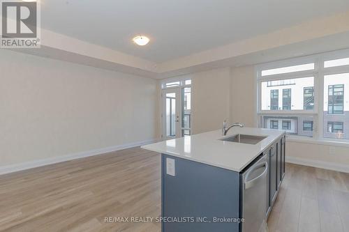 104 - 1597 Rose Way, Milton, ON - Indoor Photo Showing Kitchen