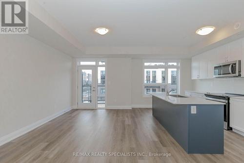 104 - 1597 Rose Way, Milton, ON - Indoor Photo Showing Kitchen With Upgraded Kitchen