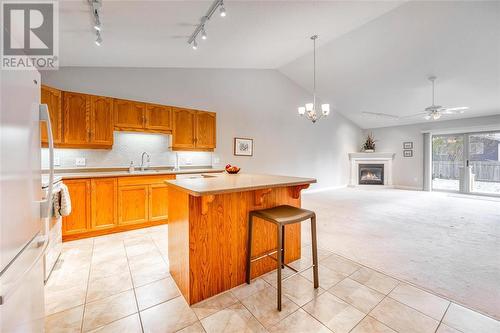 507 Louisa Street Unit# B, Point Edward, ON - Indoor Photo Showing Kitchen With Fireplace