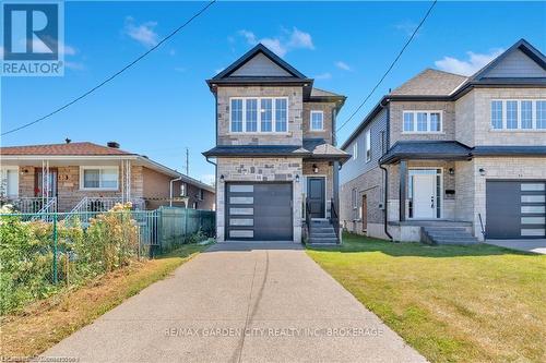 86 Beland Avenue N, Hamilton (Mcquesten), ON - Outdoor With Facade