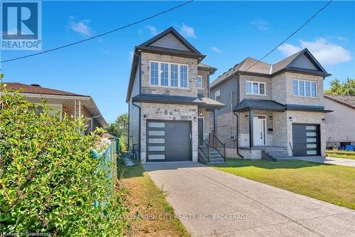 86 Beland Avenue N, Hamilton (Mcquesten), ON - Outdoor With Facade