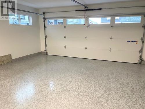 167 1310 Mitcell Street, Coquitlam, BC - Indoor Photo Showing Garage