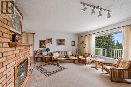 3620 Webber Road, West Kelowna, BC - Indoor Photo Showing Living Room With Fireplace