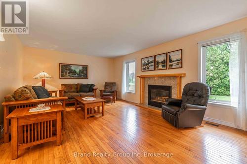 109 Alexandria St Street, Georgian Bluffs, ON - Indoor Photo Showing Living Room With Fireplace