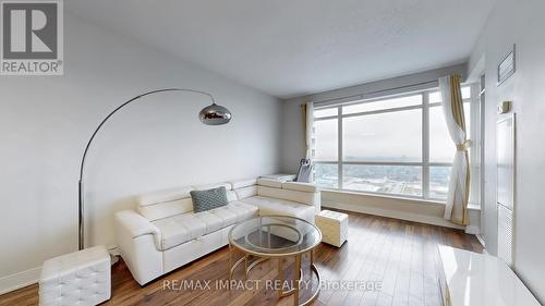 2212 - 125 Village Green Square, Toronto, ON - Indoor Photo Showing Living Room