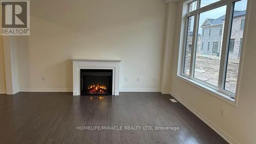 8 Eastman Drive, Brampton, ON - Indoor Photo Showing Living Room With Fireplace