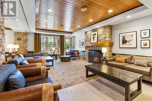 326 - 152 Jozo Weider Boulevard S, Blue Mountains (Blue Mountain Resort Area), ON - Indoor Photo Showing Living Room With Fireplace