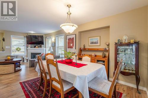 1002 Peachcliff Drive, Okanagan Falls, BC - Indoor Photo Showing Dining Room With Fireplace