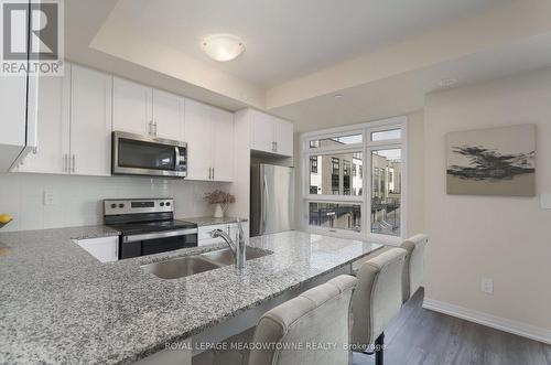 108 - 1565 Rose Way, Milton, ON - Indoor Photo Showing Kitchen With Stainless Steel Kitchen With Double Sink With Upgraded Kitchen