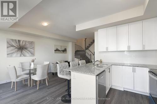 108 - 1565 Rose Way, Milton, ON - Indoor Photo Showing Kitchen With Double Sink