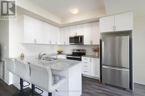 108 - 1565 Rose Way, Milton, ON - Indoor Photo Showing Kitchen With Stainless Steel Kitchen With Double Sink With Upgraded Kitchen