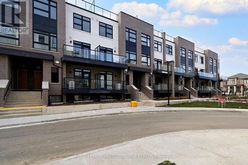 108 - 1565 Rose Way, Milton, ON - Outdoor With Balcony With Facade