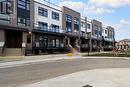 108 - 1565 Rose Way, Milton, ON  - Outdoor With Balcony With Facade 