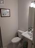 Bathroom featuring tile patterned floors and toilet - 9 Hyde Park Mews, Kitchener, ON  - Indoor Photo Showing Bathroom 