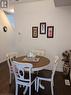 Dining space with dark hardwood / wood-style flooring - 9 Hyde Park Mews, Kitchener, ON  - Indoor Photo Showing Dining Room 