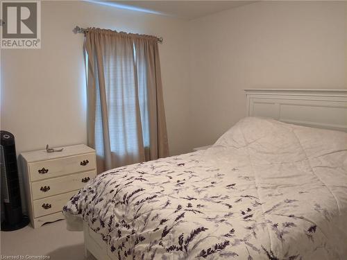 View of carpeted bedroom - 9 Hyde Park Mews, Kitchener, ON - Indoor Photo Showing Bedroom