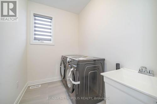 22 Wraggs Road, Bradford West Gwillimbury, ON - Indoor Photo Showing Laundry Room