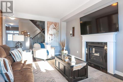 29 Nadmarc Court, Essa, ON - Indoor Photo Showing Living Room With Fireplace