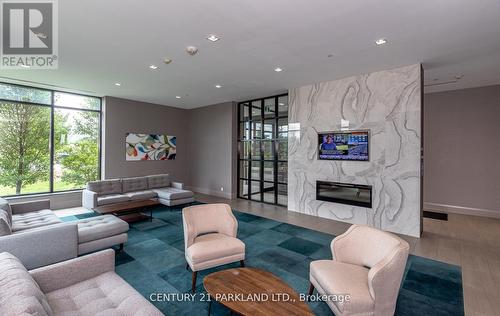 Ph 438 - 555 William Graham Drive W, Aurora, ON - Indoor Photo Showing Living Room With Fireplace