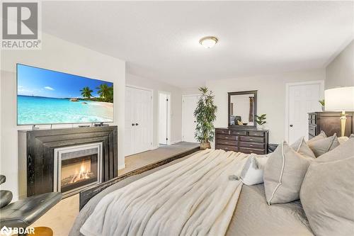 64 Spotted Owl Crescent, Brampton, ON - Indoor Photo Showing Bedroom With Fireplace