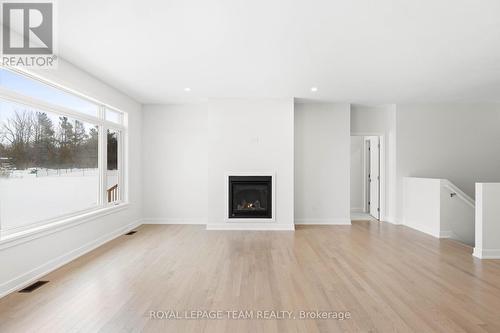 285 Wood Avenue, Smiths Falls, ON - Indoor Photo Showing Living Room With Fireplace