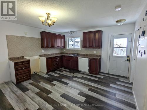 576 Spooner Drive, Timmins (Tnw - Riverpark), ON - Indoor Photo Showing Kitchen With Double Sink