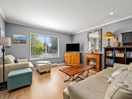 101-130 Back Rd, Courtenay, BC - Indoor Photo Showing Living Room With Fireplace