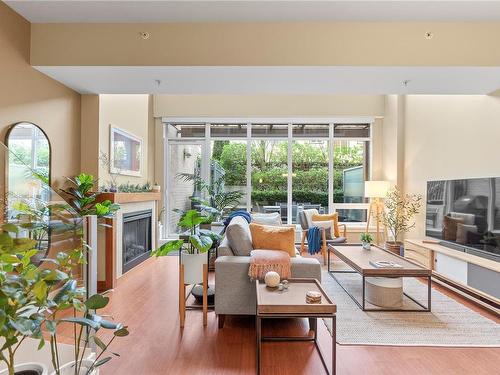 302-828 Rupert Terr, Victoria, BC - Indoor Photo Showing Living Room With Fireplace