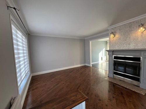 Living room - 2915 Rue Boiselle, Boisbriand, QC - Indoor With Fireplace