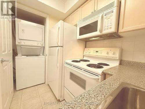 801 - 30 Harrison Garden Boulevard, Toronto, ON - Indoor Photo Showing Laundry Room