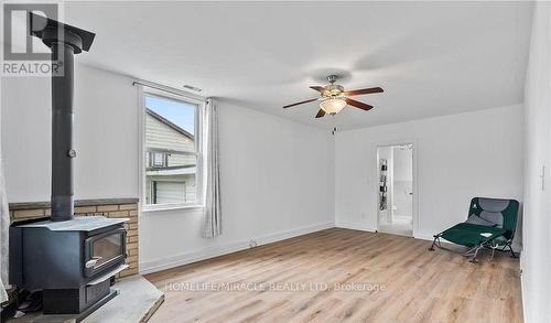 22 William Street S, Minto, ON - Indoor Photo Showing Other Room With Fireplace