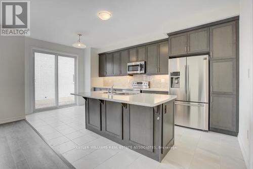 546 Fir Court, Milton, ON - Indoor Photo Showing Kitchen With Stainless Steel Kitchen With Upgraded Kitchen