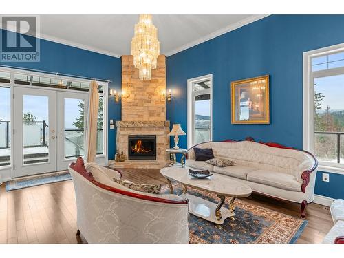 5475/5477 Kingsview Road, Vernon, BC - Indoor Photo Showing Living Room With Fireplace