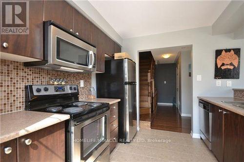 765 Challinor Terrace, Milton, ON - Indoor Photo Showing Kitchen With Stainless Steel Kitchen