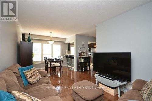 765 Challinor Terrace, Milton, ON - Indoor Photo Showing Living Room