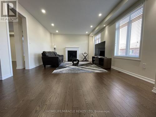 84 Roulette Crescent, Brampton, ON - Indoor Photo Showing Living Room With Fireplace