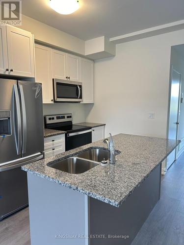 1302 - 160 Densmore Road, Cobourg, ON - Indoor Photo Showing Kitchen With Stainless Steel Kitchen With Double Sink With Upgraded Kitchen