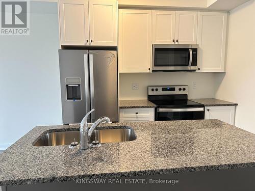 1302 - 160 Densmore Road, Cobourg, ON - Indoor Photo Showing Kitchen With Stainless Steel Kitchen With Double Sink With Upgraded Kitchen