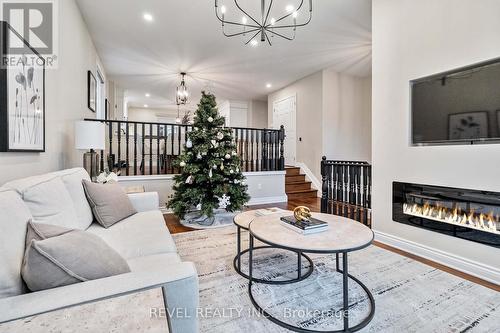 89 Court Drive, Brant, ON - Indoor Photo Showing Living Room With Fireplace