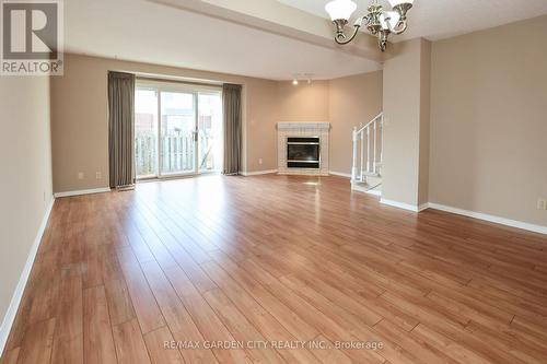 44 - 55 Kerman Avenue, Grimsby, ON - Indoor Photo Showing Living Room With Fireplace