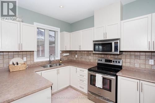 54 Ellis Crescent, Kawartha Lakes (Lindsay), ON - Indoor Photo Showing Kitchen With Double Sink