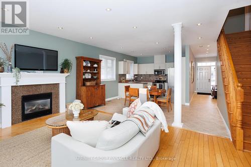 54 Ellis Crescent, Kawartha Lakes (Lindsay), ON - Indoor Photo Showing Living Room With Fireplace