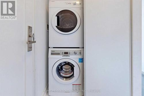 2702 - 28 Wellesley Street E, Toronto, ON - Indoor Photo Showing Laundry Room