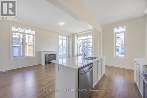 1802 Floribunda Gardens, Pickering, ON - Indoor Photo Showing Kitchen With Fireplace With Double Sink