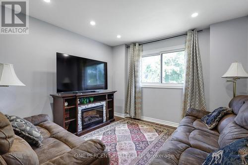 906 Cahill Drive W, Ottawa, ON - Indoor Photo Showing Living Room With Fireplace