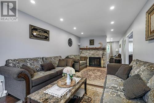 906 Cahill Drive W, Ottawa, ON - Indoor Photo Showing Living Room With Fireplace