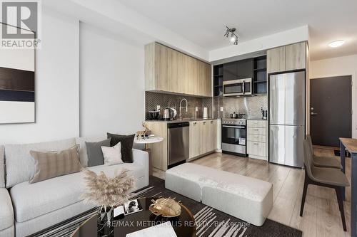 1409 - 10 De Boers Drive, Toronto, ON - Indoor Photo Showing Kitchen With Stainless Steel Kitchen